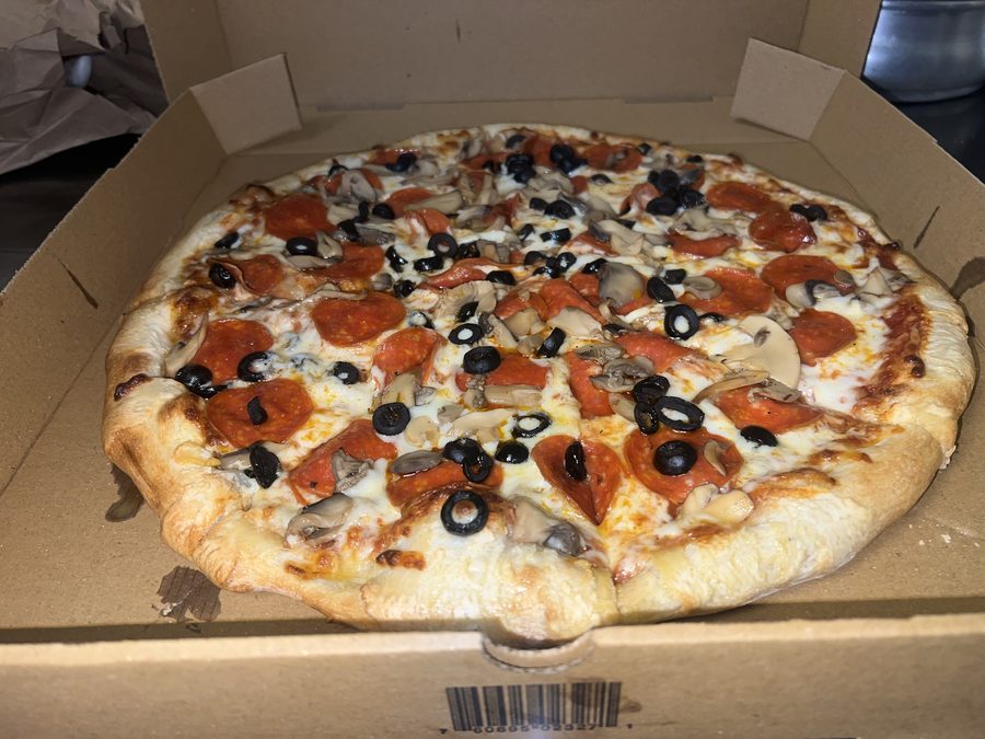 Pepperoni, mushroom and olive pizza