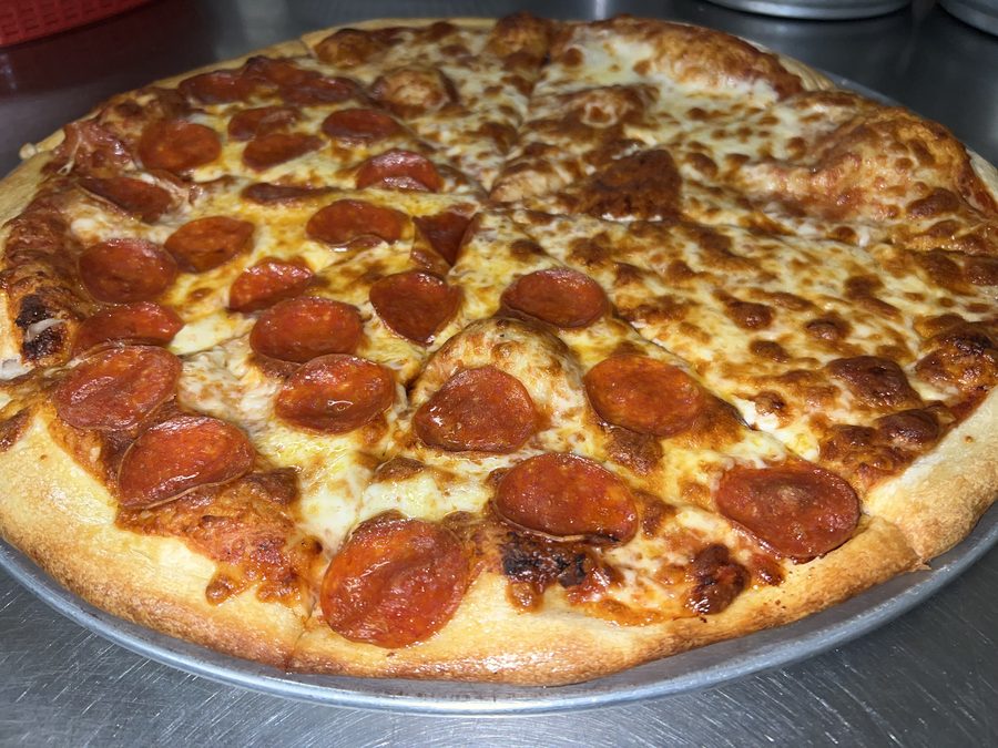 Half pepperoni, half cheese pizza