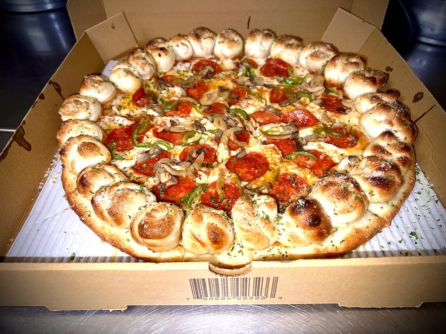 Pizza Knots ring stuffed with pepperoni, sausage, mushroom and peppers