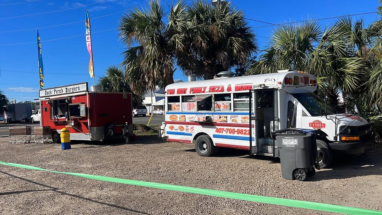 The food truck menu boards on the side of the truck